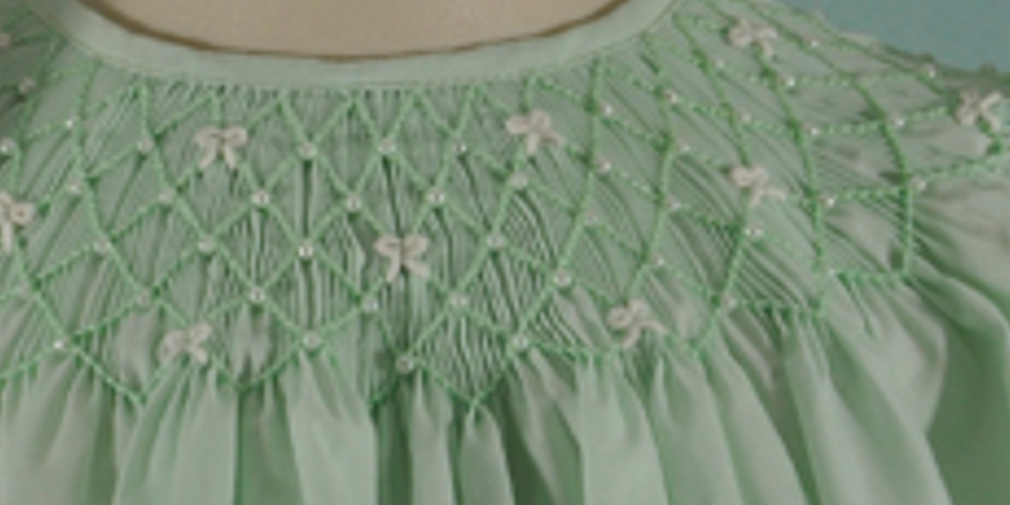 Mint Geometric Smocked Short Sleeve Bishop Dress featuring Little White Bows