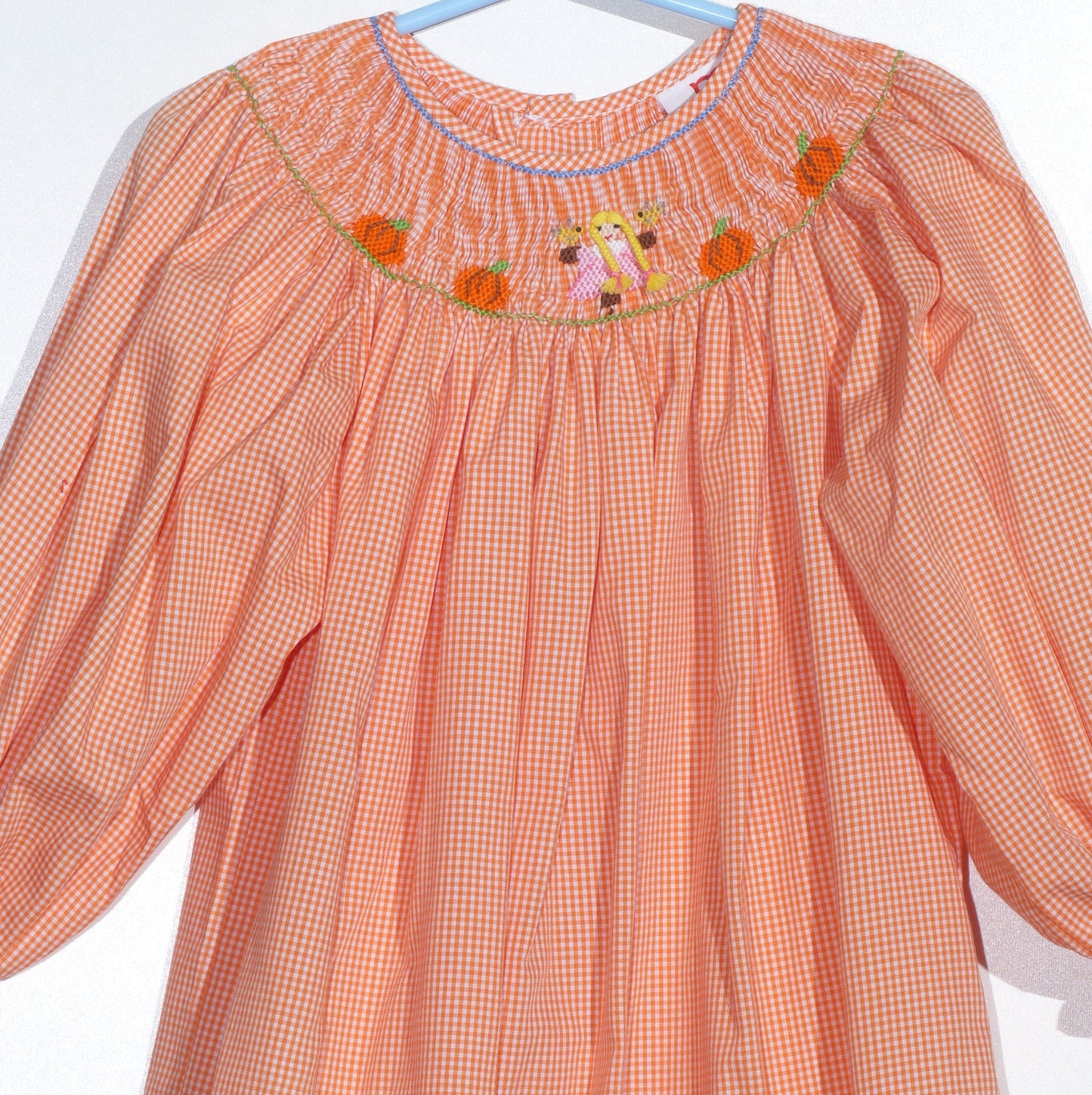 Orange Gingham Long Bishop Sleeve Dress featuring GIRL WITH BRAIDED HAIR & PUMPKINS Smocked