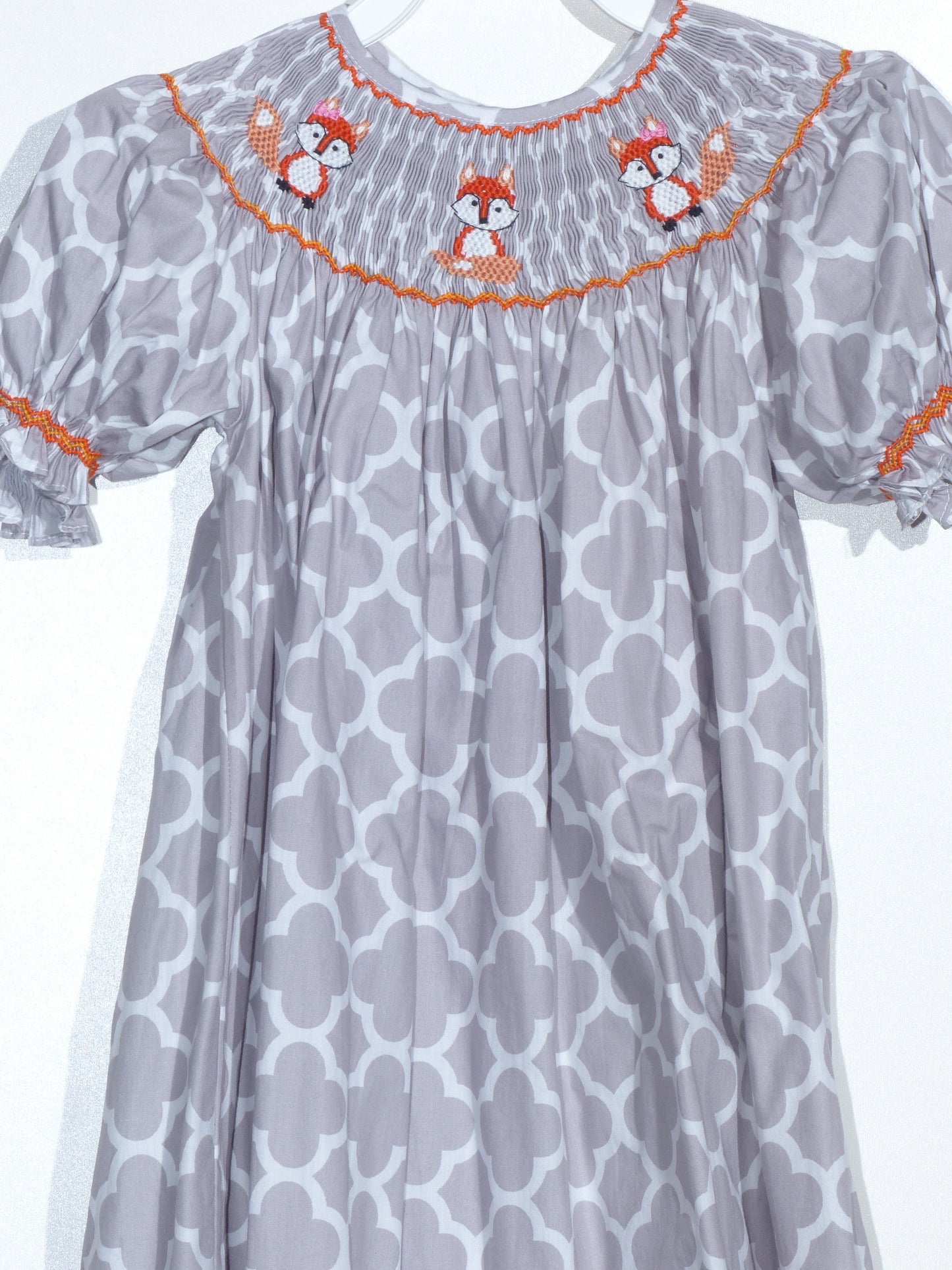 Grey Quartrefoil Pattern Short Bishop Sleeve Dress Featuring FOXES Hand-Smocked