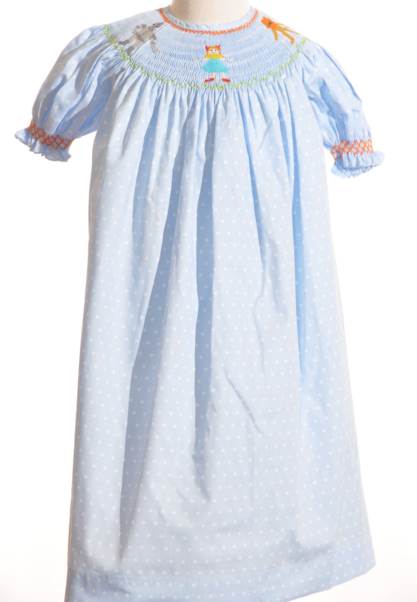 Light Blue Polka Dot Short Sleeve Dress featuring WIZARD OF OZ HAND-SMOCKED