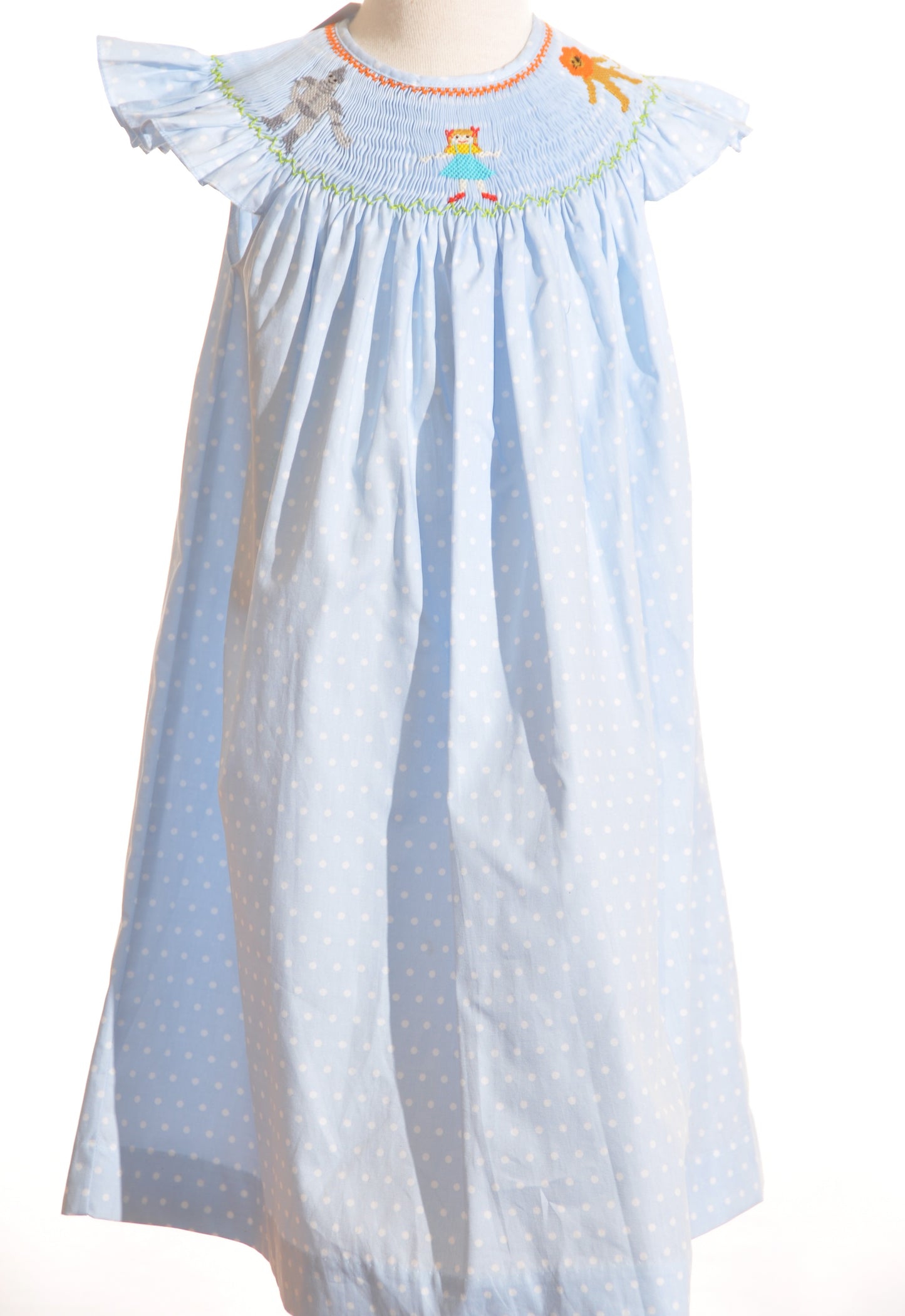Light Blue Polka Dot Angel Wing Dress featuring WIZARD OF OZ HAND-SMOCKED