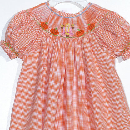 Orange Gingham Short Bishop Sleeve Dress featuring GIRL WITH BRAIDED HAIR & PUMPKINS Smocked (Copy)