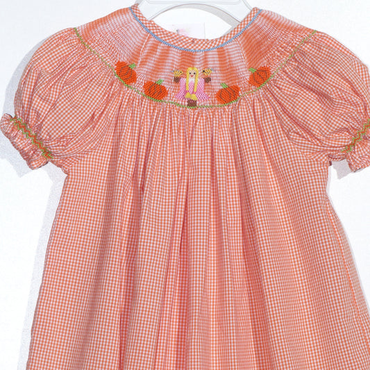Orange Gingham Short Bishop Sleeve Dress featuring GIRL WITH BRAIDED HAIR & PUMPKINS Smocked (Copy)