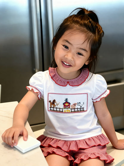 Red gingham FARM HOUSE Smocked Short Set featuring a white top and red gingham ruffle