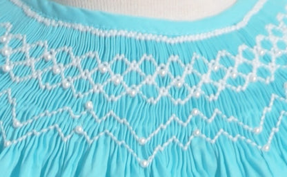 Blue Geo Smocked With Pearls Angel Wing Sleeve Bishop Dress