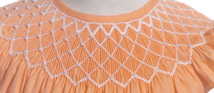 Orange Pearl Geometric Smocked Angle Wing Sleeve Dress
