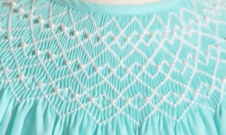 Turquise Geo Smocked With Pearls Short Sleeve Bishop Dress