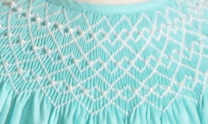Turquise Geo Smocked With Pearls Short Sleeve Bishop Dress