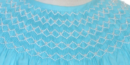 Blue Geo Smocked With Pearls Angel Wing Sleeve Bishop Dress
